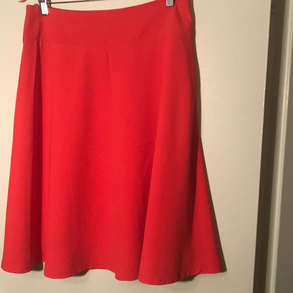 Brand new skirt! Orange/red skirt with a flare